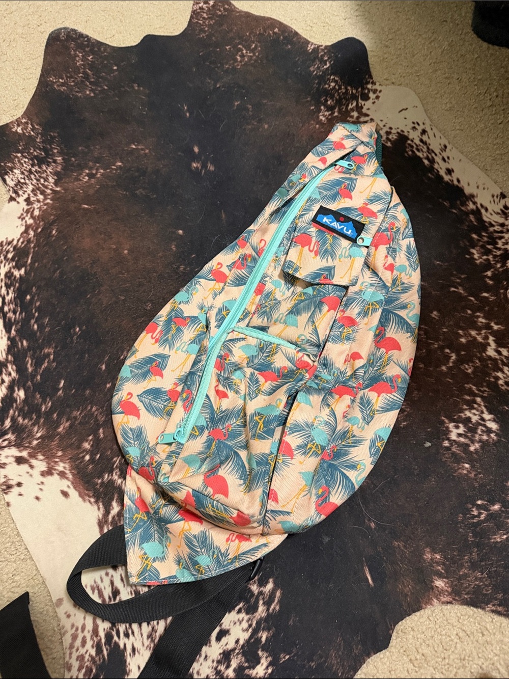 Kavu Tropical Print Sling Bag in Beige and Teal